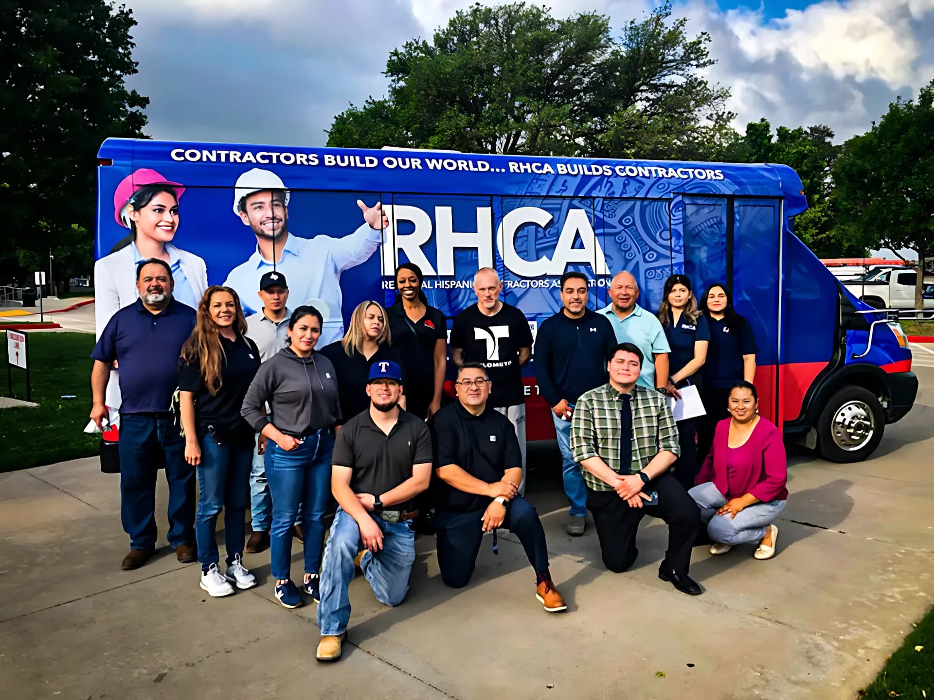 RHCA staff and trainees in front of the Mobile Training Unit