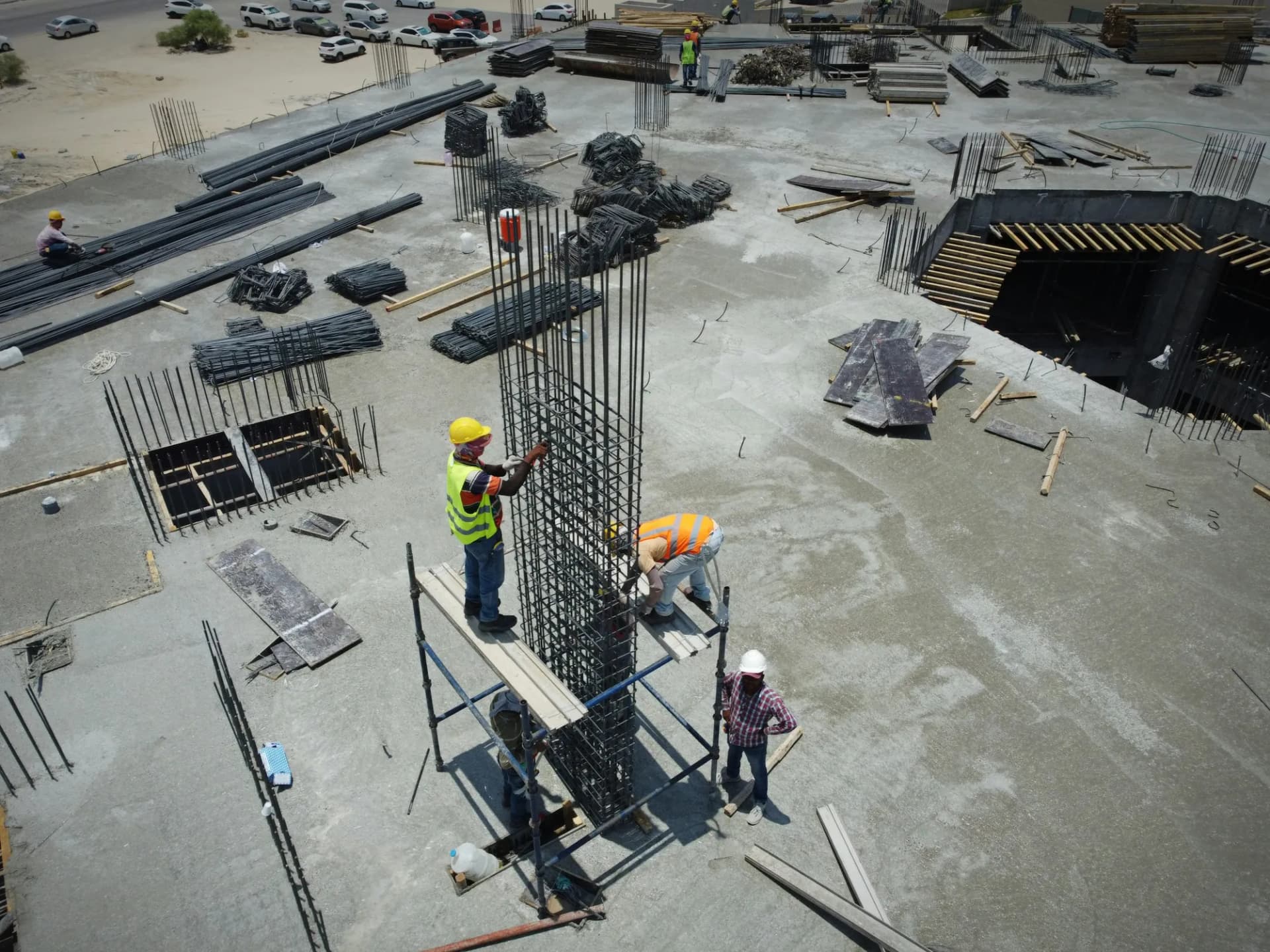 Crew standing on a construction site.
